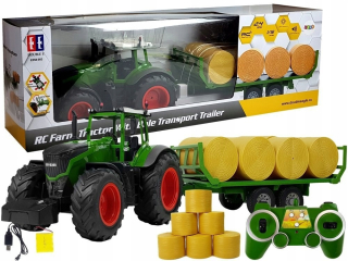 Diaľkovo ovládaný traktor s prívesom chlapca